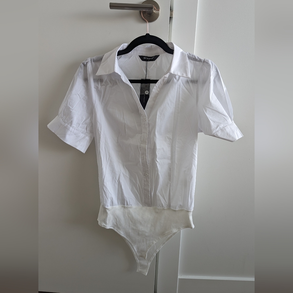 White formal shirt, button closure on the sleeves, bodysuit